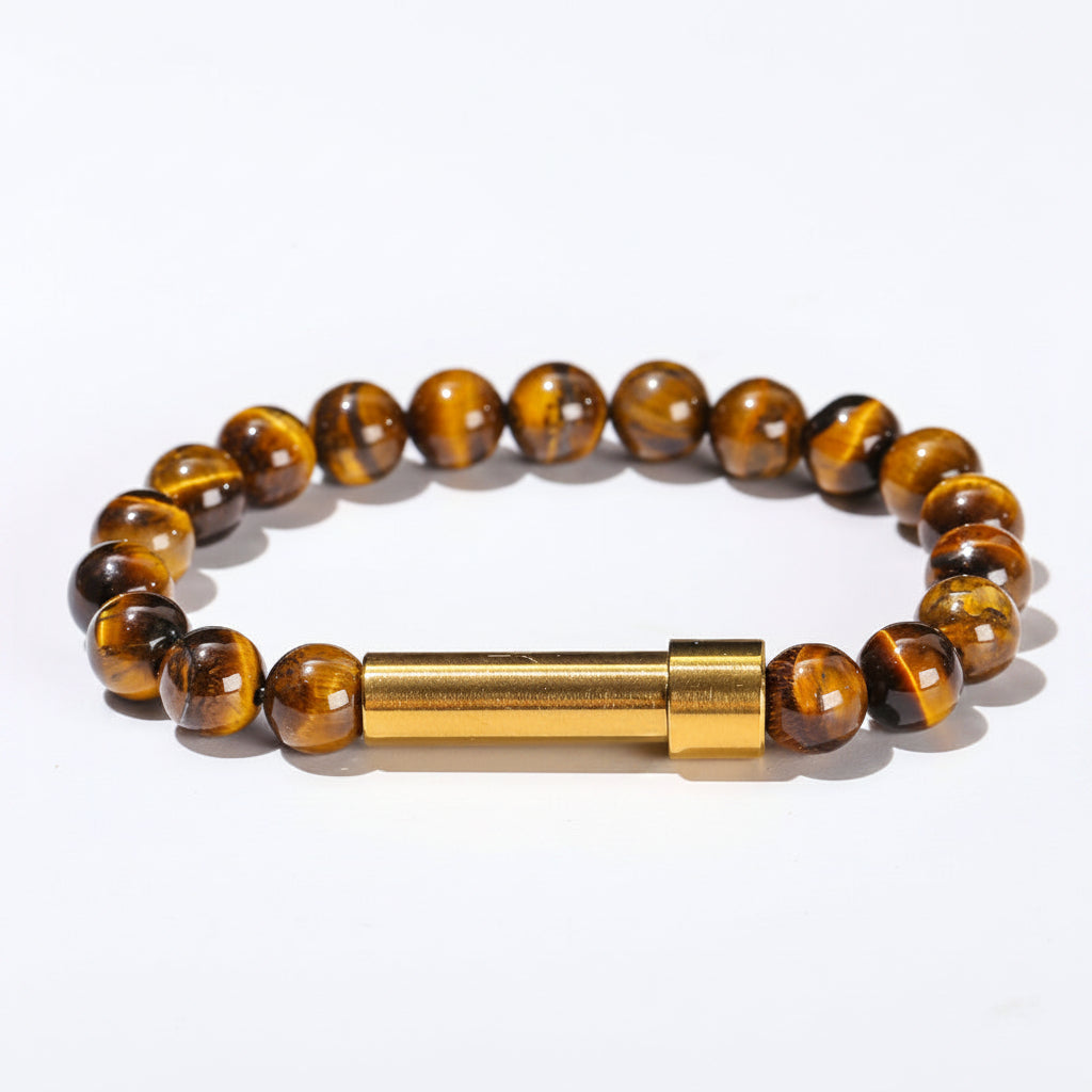 A beaded bracelet made of round brown and gold tiger's eye stones with a cylindrical gold magnetic clasp, shown on a white background with dimension labels indicating 19cm diameter, 29mm width, and 8mm stone diameter.
